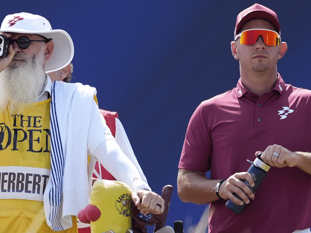 Rules debate swirls during Open leader’s historic round, caddie shuts it down   ​